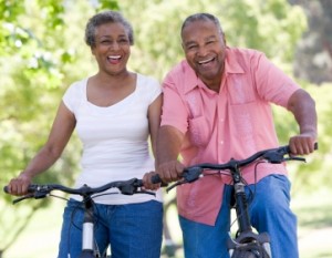 Senior couple on cycle ride in countryside