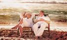 villageparkhomes-Couple-on-Beach-in-Chairs